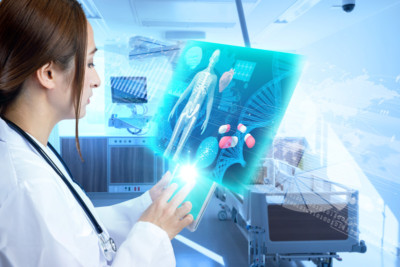 female doctor looking at iPad with augmented reality photoshopped graphic of Skelton and DNA strand